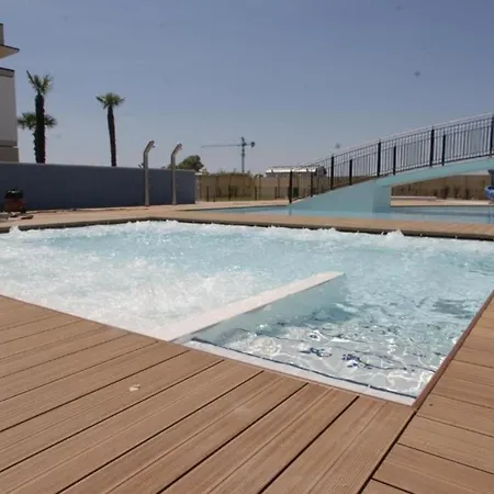 Relaxing In A Village With Swimming Pool