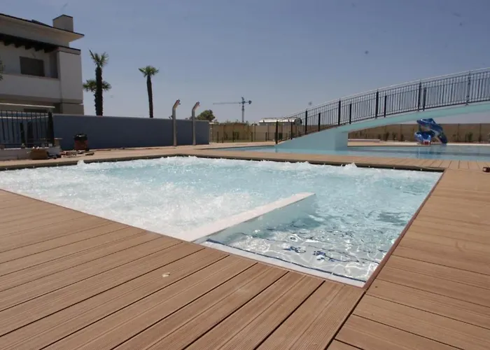 Relaxing In A Village With Swimming Pool